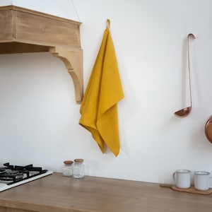 Beautiful organic linen towel made from 100% natural flax — soft, durable, and eco-friendly. Perfect as a kitchen or bath tea towel, this high-quality handmade linen sheet brings a warm natural texture to any home. Ideal sustainable gift for Thanksgiving dinner, Christmas morning, New Year’s Eve celebration, or Valentine’s Day. Elegant and timeless design by CoolLinen — modern organic home décor brand focused on quality, simplicity, and sustainability.