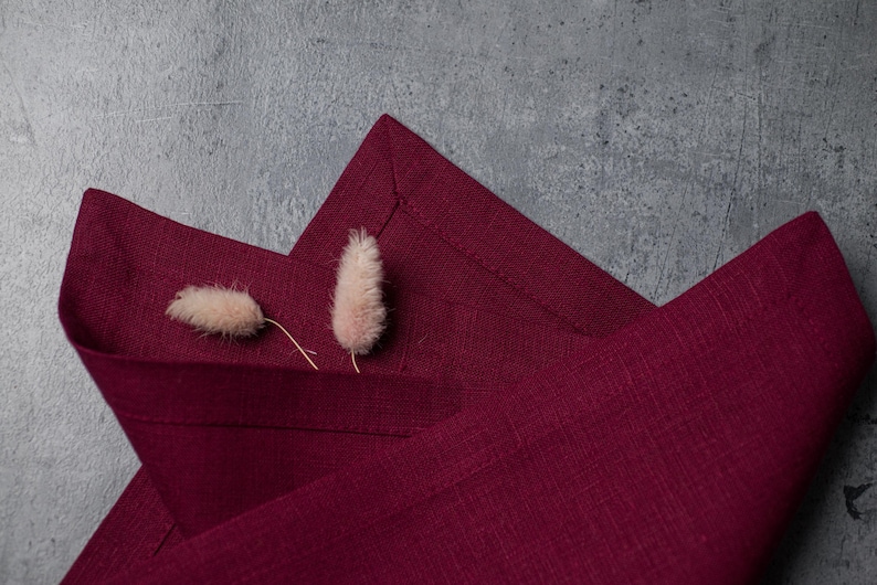 Plum organic linen napkins in a rich deep shade, perfect for elegant table styling, romantic dinners, autumn entertaining and luxury home decor. Soft washed reusable linen fabric with natural texture and refined mitered corners, designed for weddings, farmhouse dining, cottagecore interiors and modern minimalist tablescapes. Handmade eco friendly dinner napkins in a timeless plum color that adds warmth, depth and sophistication to everyday dining, holiday gatherings, sustainable table settings
