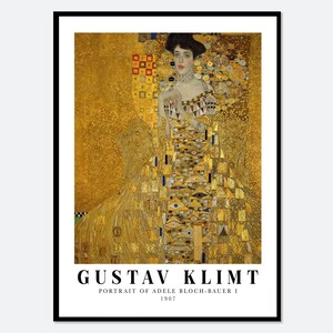 Könnte beinhalten: Ein gerahmter Kunstdruck von Gustav Klimts Porträt der Adele Bloch-Bauer I, 1907. Das Gemälde zeigt eine Person in einem goldfarbenen, gemusterten Kleid vor einem schimmernden goldenen Hintergrund mit geometrischen Formen und mosaikartigen Details.