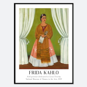 May include: A painting of Frida Kahlo, a self-portrait dedicated to Leon Trotsky. The painting shows Frida Kahlo standing in front of a green background with white curtains on either side. She is wearing a brown shawl and a pink dress. She is holding a bouquet of flowers in her right hand and a letter in her left hand. The painting is titled "Frida Kahlo" and the text "Self-portrait dedicated to Leon Trotsky" is below the title. The text "National Museum of Women in the Arts, 1937" is below the dedication.