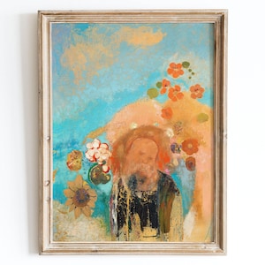May include: A framed vertical art print featuring a stylized portrait of a person with a beard, surrounded by abstract orange and red floral elements against a textured light blue background. The figure wears a dark garment with gold accents.