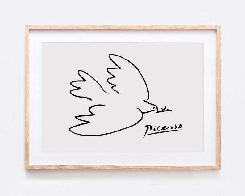 May include: A black and white line drawing of a dove with an olive branch in its beak. The drawing is signed "Picasso" in the bottom right corner.
