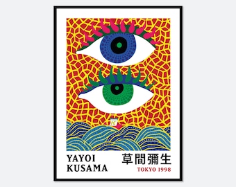 May include: A framed art print featuring two large eyes with blue and green irises, set against a yellow background with a red grid pattern. Below the eyes are stylized blue waves and the text YAYOI KUSAMA, TOKYO 1998, and Japanese characters.
