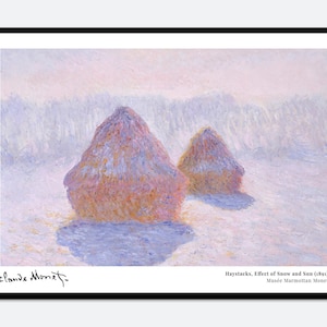 May include: A framed art print of Claude Monet's painting Haystacks, Effect of Snow and Sun (1891). The image depicts two large haystacks in a snowy field with soft pink and blue light. The text Claude Monet and the title are printed below.