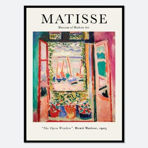 May include: A framed art print featuring Henri Matisse's 1905 painting The Open Window. The image displays a colourful view through an open window with sailboats, potted plants, and vibrant pink, green, and blue tones, set in a black frame.