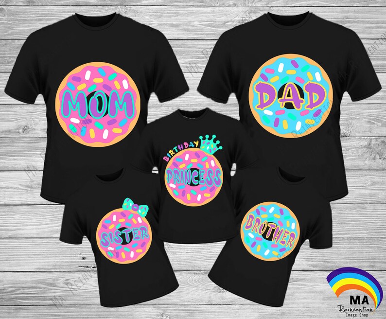 May include: Set of five black t-shirts with donut designs. The donuts have pink, blue, and yellow frosting with colorful sprinkles. The shirts say "Mom", "Dad", "Birthday Princess", "Sister", and "Brother".