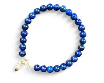 Pulseira de contas de lápis-lazúli azul com fecho de ouro 14k