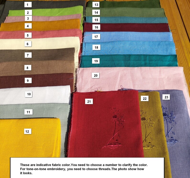 May include: A collection of 23 fabric swatches in various colors, numbered 1 through 23. The swatches are arranged in rows, with the numbers displayed on the left side of the image. The last three swatches have embroidered designs on them.