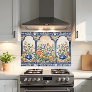 May include: A kitchen backsplash with a floral design, featuring orange, blue, and yellow flowers in blue vases. The backsplash is framed by a blue border and is installed above a gas hob.