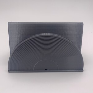Now Playing record stand minimalist style in gray color