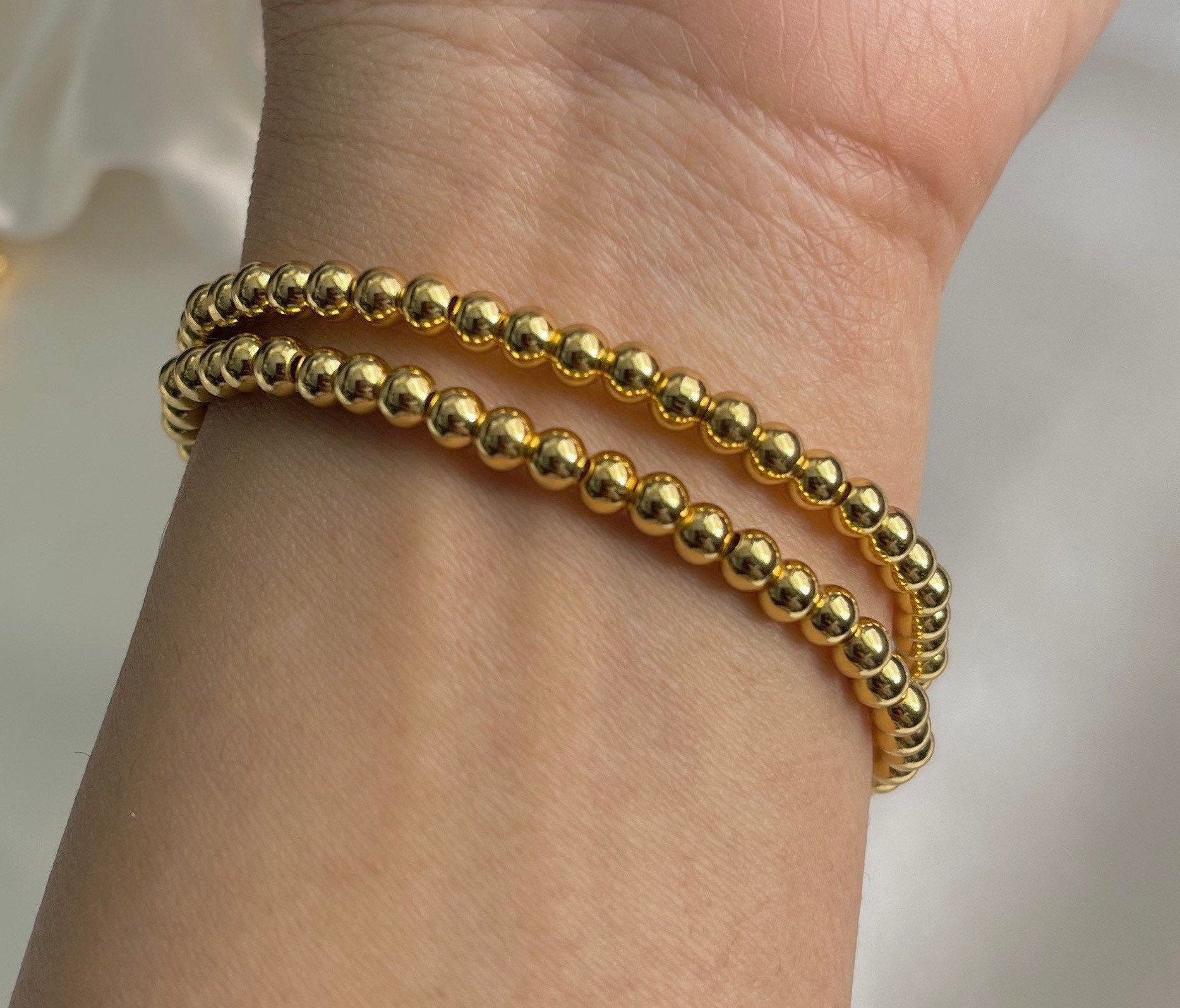 Gold ball stretch bracelet sale