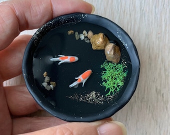 Miniature Koi pond - koi, black bowl with gold accent, rocks, and water plant for fairy garden and terrarium