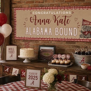 May include: A rectangular banner with a red and white gingham border featuring the text CONGRATULATIONS Anna Kate ALABAMA BOUND and an illustration of an elephant holding an Alabama Crimson Tide flag, displayed above a party table setup.