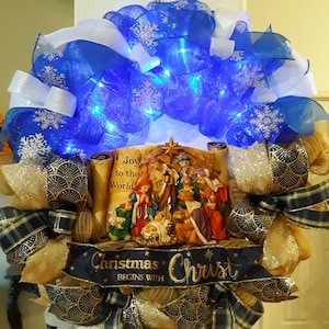 Christmas Nativity deco mesh wreath with Nativity scroll sign, lights, and wired ribbons. Home decor, gift for men, women, family.