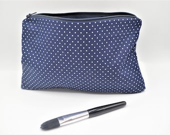 Toiletry or make-up bag, cotton tote, lined with zipper.