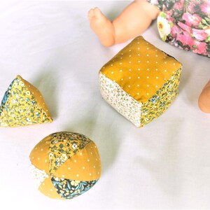 Trio of cotton and wadding baby balls