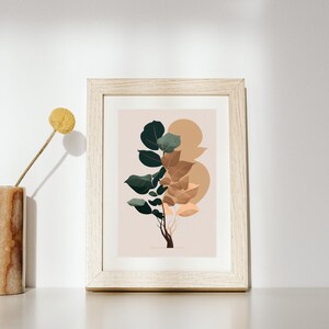 May include: A framed print of a stylized illustration of a green and brown leafy plant with abstract shapes in beige and brown behind it. The print is in a light wood frame.