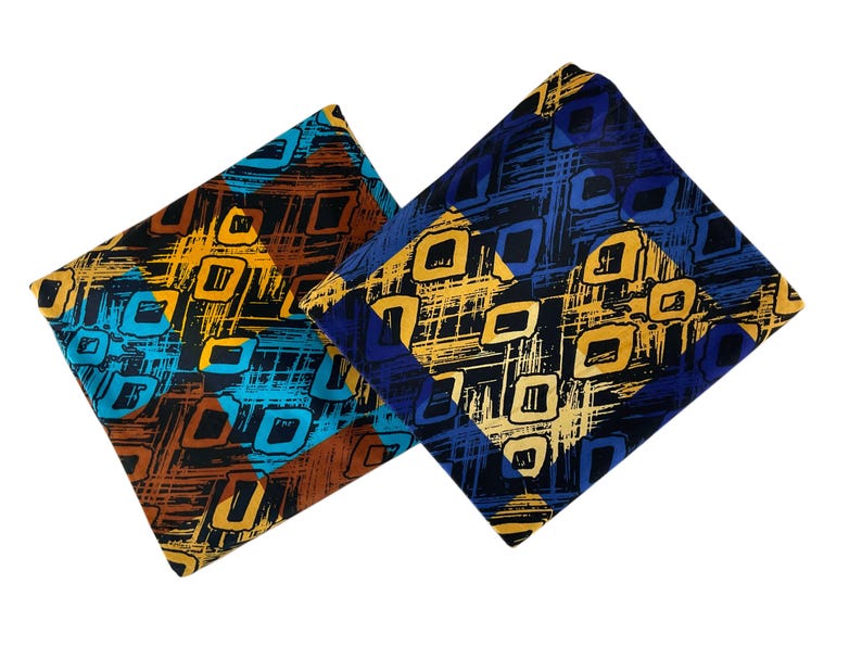 May include: Two folded pieces of fabric featuring a geometric pattern of black, yellow, and blue squares overlaid on a textured, cross-hatched background. One piece incorporates brown tones, while the other displays deep blue and black color accents.