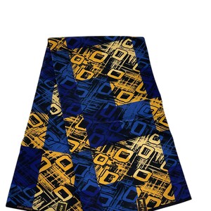 May include: A folded piece of fabric featuring a geometric pattern of blue and yellow squares and rectangles. The design includes dark blue, light blue, and golden yellow hues with a textured, brushstroke-like background. The text FIRST CHOICE is visible.