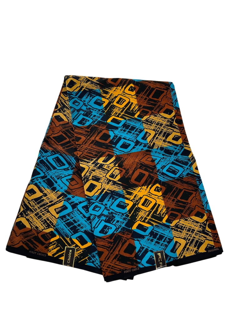 May include: A folded piece of fabric featuring a geometric pattern of black, brown, and bright blue squares and rectangles. The design includes textured, cross-hatched lines in yellow and brown. The fabric has labels reading First Choice.