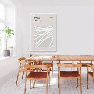 May include: A minimalist poster with the text "White Sands" in black lettering on a light gray background. The poster features a white abstract design of lines and curves.