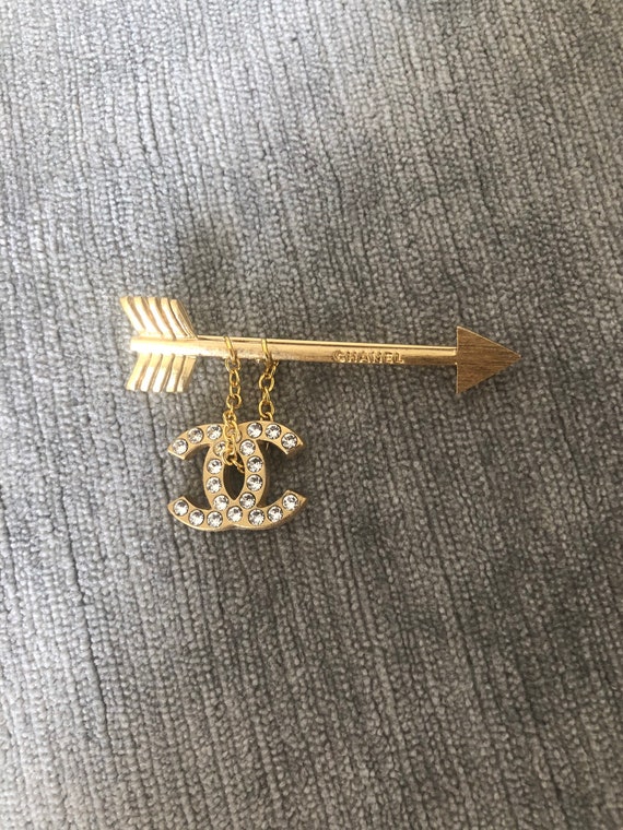 Chanel gold arrow CC charm brooch