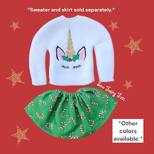 May include: White elf-sized sweater with a gold unicorn design and a green skirt with a candy cane pattern. The text "Sew Fairy Fun" and "*Other colors available.*" are also visible.