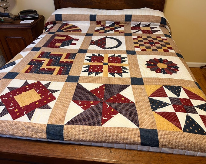 Vintage handmade quilt fits full/Queen sized bed