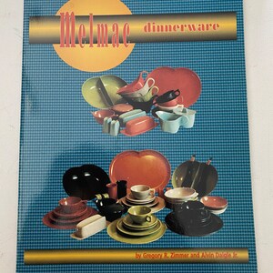 May include: A book titled "Melmac Dinnerware" by Gregory R. Zimmer and Alvin Daigle Jr. The cover features a colorful display of Melmac dinnerware, including plates, bowls, cups, and a butter dish.