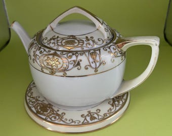 Vintage Noritake Porcelain Tea Pot with Lid and Matching Trivet Made in Japan Lover Antiques and Vintage