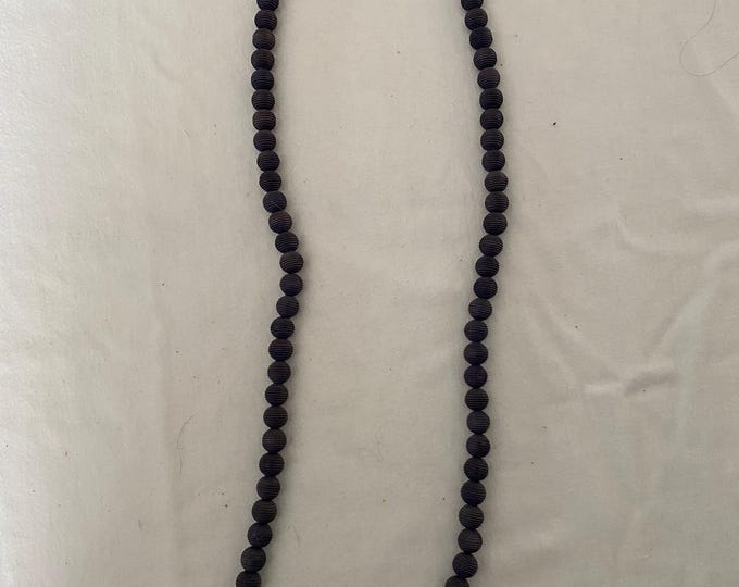 Vintage Black Beaded Long Necklace with Striations Giving it a Mid Century Vibe Necklace Unique Gifts at Lover Antiques and Vintage