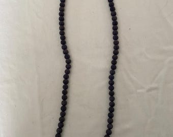 Vintage Black Beaded Long Necklace with Striations Giving it a Mid Century Vibe Necklace Unique Gifts at Lover Antiques and Vintage