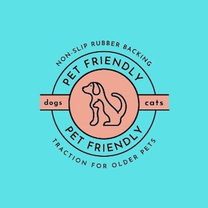 May include: A pink and blue circular logo with the text "PET FRIENDLY" in a black circle. The logo also includes the text "NON-SLIP RUBBER BACKING" and "TRACTION FOR OLDER PETS". The logo features a line drawing of a dog and cat.