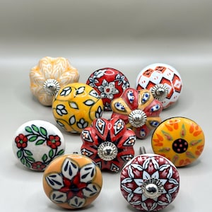 Set van 10 oranje en rode meubelknoppen – kleurrijke lade- en kastgrepen