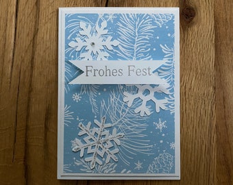 Weihnachtskarte Frohes Fest Weihnachtssterne hellblau weiß Glitzer weiße Sterne