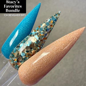 May include: Three long, pointed acrylic nails are displayed. One is a bright turquoise with glitter, the middle nail has a mix of blue, silver, and gold glitter, and the third is a light tan with glitter. The text "Stacy's Favorites Bundle" is in the upper left corner.