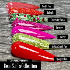 May include: A set of six nail dips with glitter finishes. The colors are red, green, pink, and a light green. The names of the dips are North Pole, Rudolph, Cookies for Santa, Prancer, Dancer, Resting Grinch Face, and Naughty List.