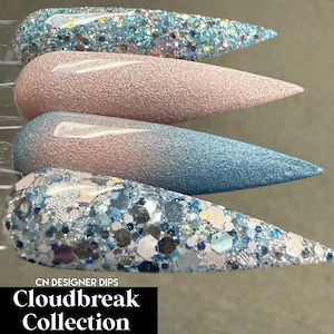 May include: Four long, oval-shaped nail tips with different designs. The first tip is a solid light pink colour. The second tip is a gradient from light pink to light blue. The third tip is a light blue colour with silver glitter. The fourth tip is a light blue colour with silver and white glitter. The tips are labelled "Cloudbreak Collection" and "CN Designer Dips".