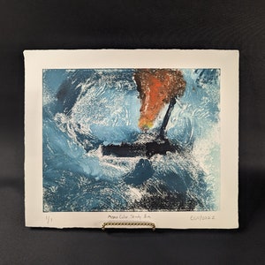 May include: A blue and orange abstract print with the text "Mono Color Study 3m" and "E01/2022" in the bottom right corner.