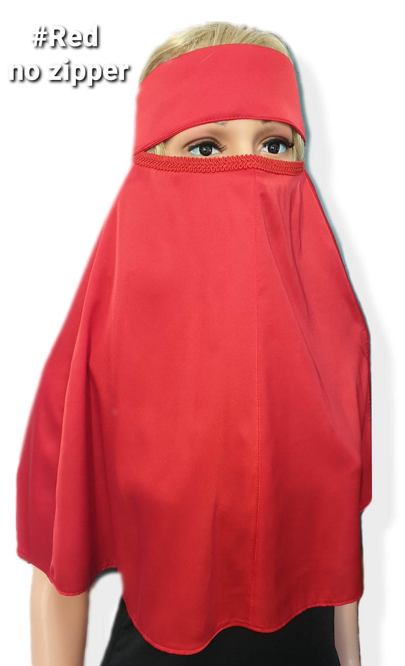 Peut inclure: Un niqab rouge avec un bandeau assorti. Le niqab a un bord festonn&eacute; et le bandeau a un design simple. #Red no zipper