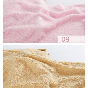 May include: Two close-up images of soft, fluffy fabric. The first image shows a light pink fabric. The second image shows a light beige fabric. The text "09" is visible in the first image and the text "10" is visible in the second image.