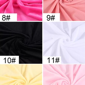 May include: Six fabric swatches in different colors, including pink, peach, black, white, yellow, and light pink. Each swatch is labeled with a number, from 8 to 13.
