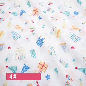 May include: White fabric with a repeating pattern of colourful birthday-themed illustrations. The illustrations include presents, party hats, stars, and crowns. The text "4#" is printed in red at the bottom of the image.