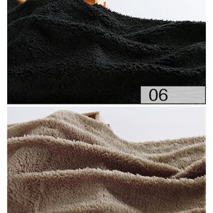 May include: Two close-up images of soft, fuzzy fabric. The first image shows black fabric. The second image shows a light brown fabric. The images are labeled with the numbers "06" and "07".