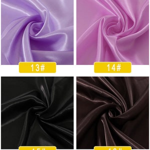 May include: Four fabric swatches in different colours: light purple, light pink, black, and dark brown. Each swatch is folded in a swirl pattern. The swatches are labelled with numbers 13, 14, 15, and 16.