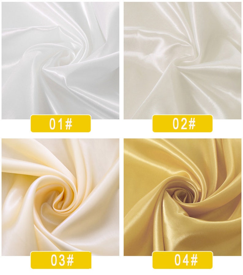 May include: Four fabric swatches in different colours. The swatches are arranged in a grid, with the top left swatch being white, the top right swatch being off-white, the bottom left swatch being a light cream colour, and the bottom right swatch being a gold colour. Each swatch is labelled with a number and a hash symbol.