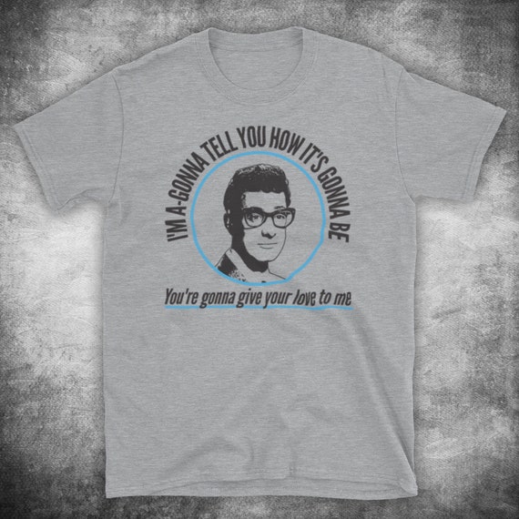 BUDDY HOLLY UNOFFICIAL NOT FADE AWAY ROCK AND ROLL 3/4 SLEEVE BASEBALL TEE BUDDY HOLLY UNOFFICIAL NOT FADE AWAY ROCK AND ROLL 3/4 SLEEVE BASEBALL TEE