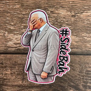 May include: A die-cut sticker featuring a cartoon illustration of a person with white hair wearing a light gray suit and tie, with one hand covering their face in a palm-to-face gesture. The text #SideBah is printed in black with a pink outline.