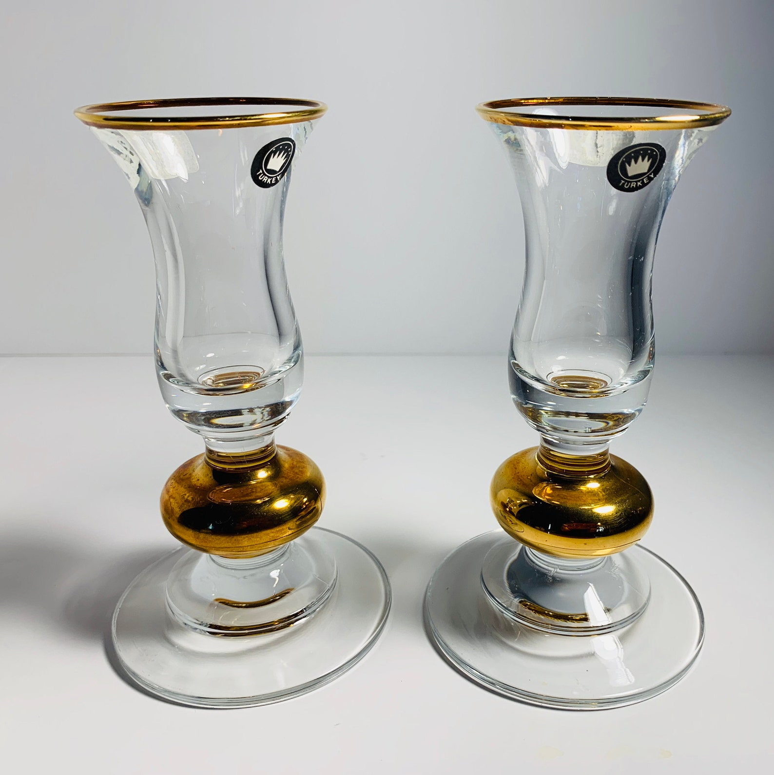 Set of 2 glass Candle holders with gold trim. Original maker Etsy