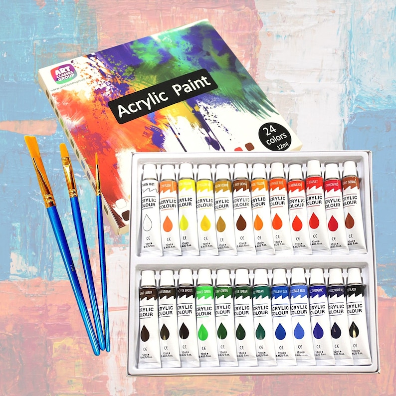 May include: A set of acrylic paints in a white box, with 24 colors in 12ml tubes. The box includes three blue-handled paintbrushes and a box with the words "Acrylic Paint" on it. The packaging has a colorful abstract design.